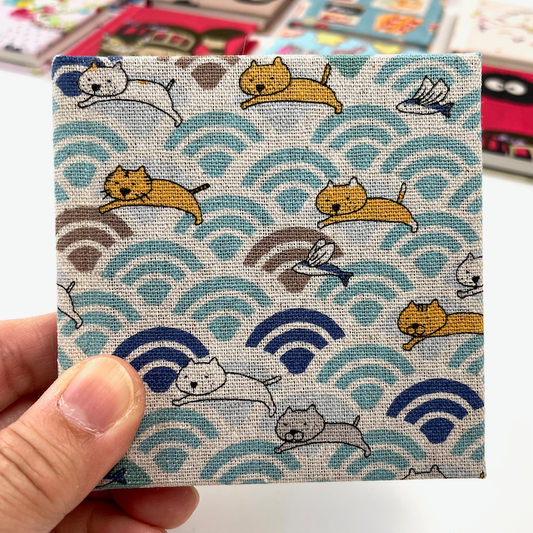 Tiny Surfing Cat